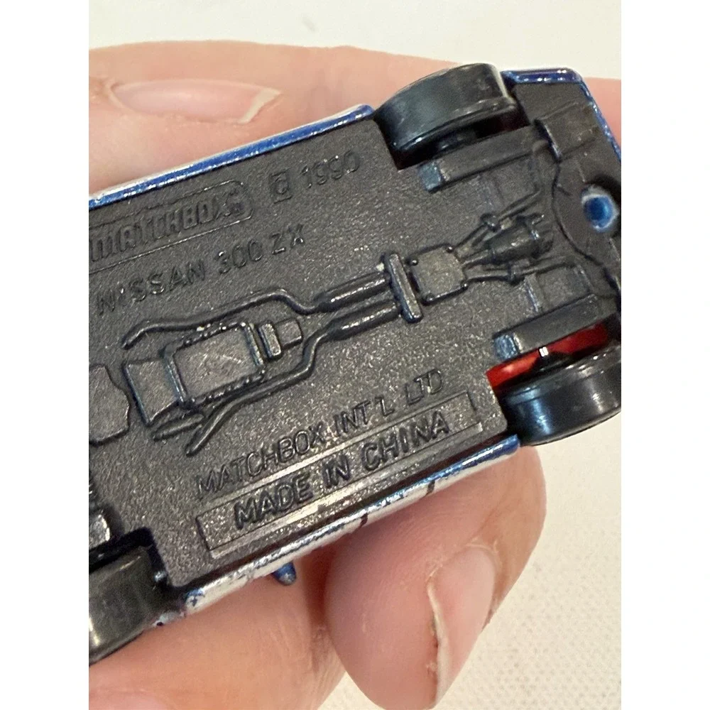 Matchbox Superfast #61 Blue Nissan 300ZX Diecast Car 1:64 Silver Metal Print